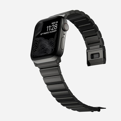 Men's sleek titanium watch band with shiny finish, magnetic clasp, durable and lightweight; perfect for daily or formal wear.