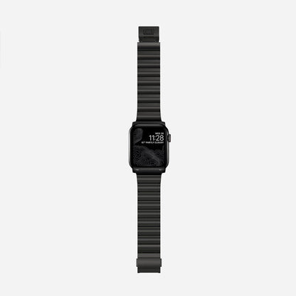 Men's sleek titanium watch band with shiny finish, magnetic clasp, durable and lightweight; perfect for daily or formal wear.
