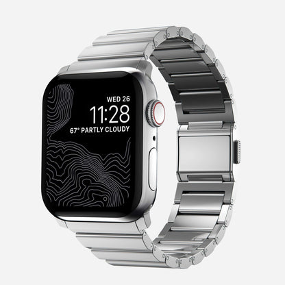 Men's sleek titanium watch band with shiny finish, magnetic clasp, durable and lightweight; perfect for daily or formal wear.