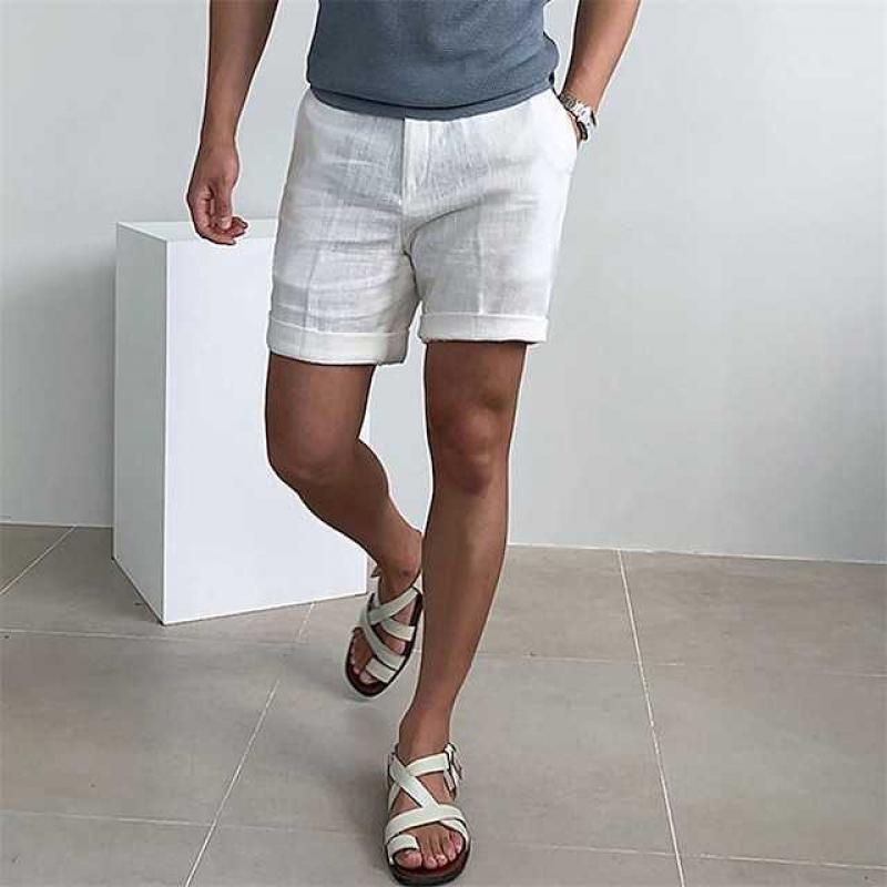 Men's vintage linen beach shorts, breathable and stylish in neutral tones, ideal for summer comfort and casual wear.