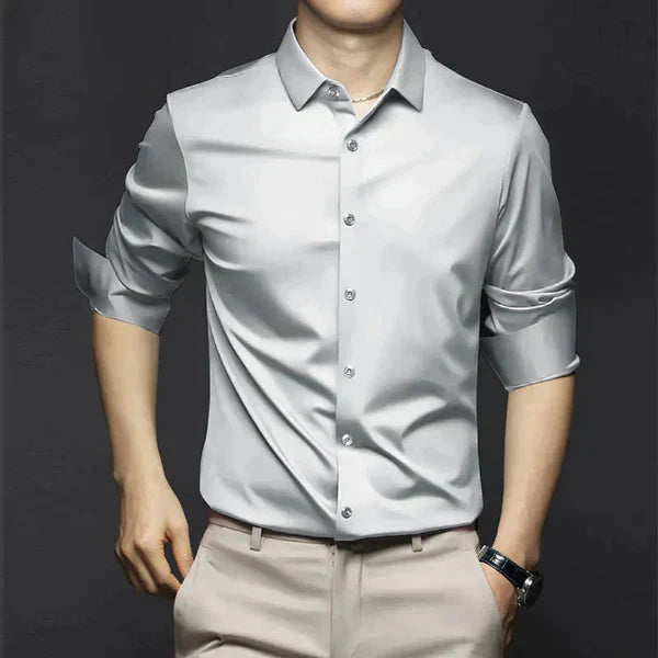 "Men's wrinkle-free dress shirt in beige. Stylish, tailored fit perfect for formal and casual settings."