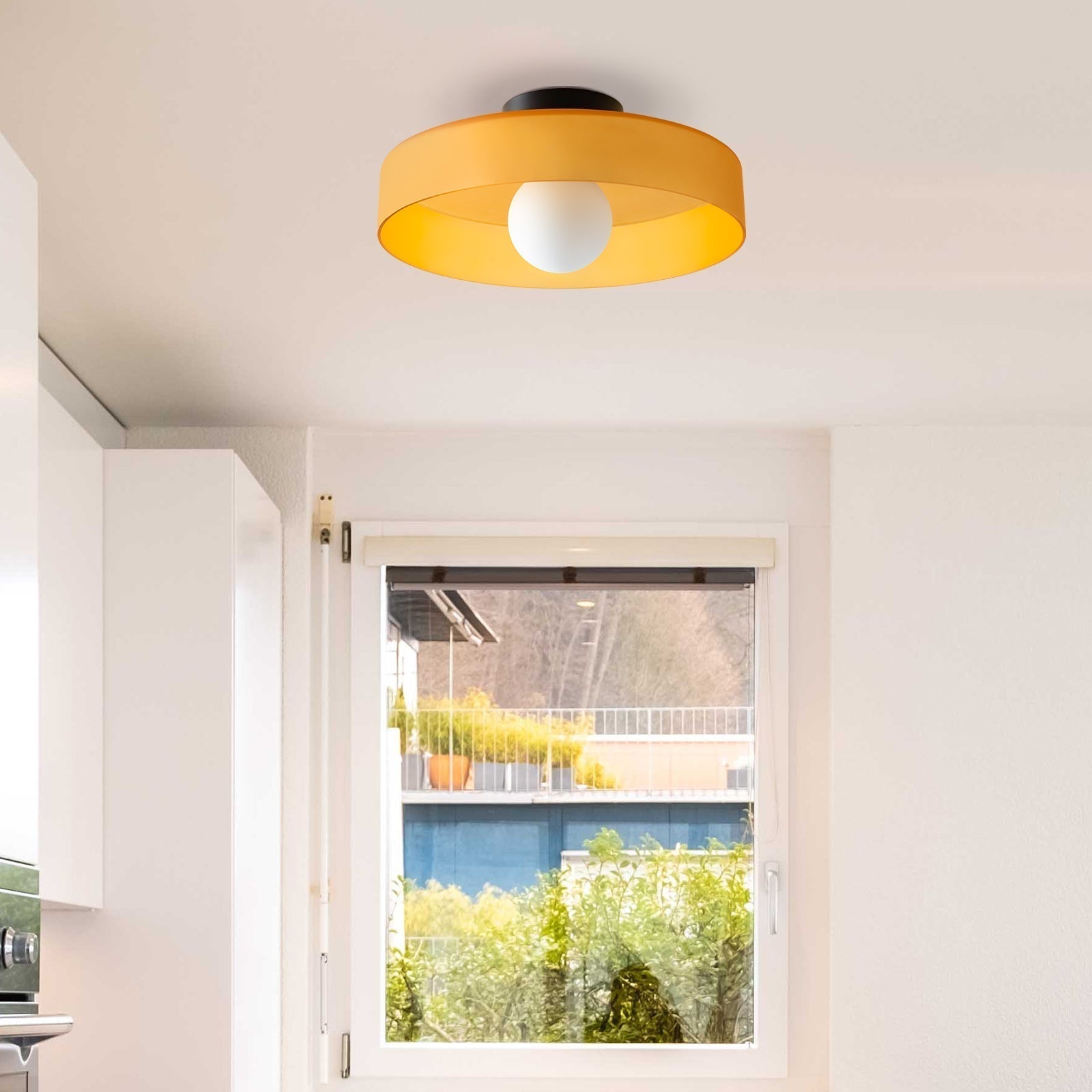 "Minimal flush mount ceiling light with frosted shade, sleek finish, offers soft illumination; ideal for modern and tradition