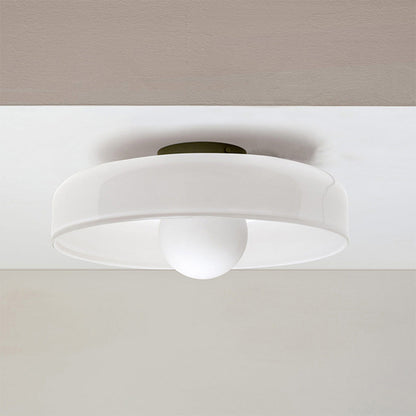 "Minimal flush mount ceiling light with frosted shade, sleek finish, offers soft illumination; ideal for modern and tradition