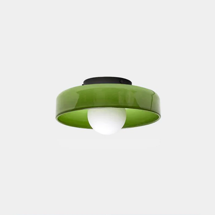 "Minimal flush mount ceiling light with frosted shade, sleek finish, offers soft illumination; ideal for modern and tradition