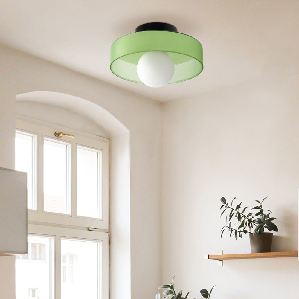 "Minimal flush mount ceiling light with frosted shade, sleek finish, offers soft illumination; ideal for modern and tradition