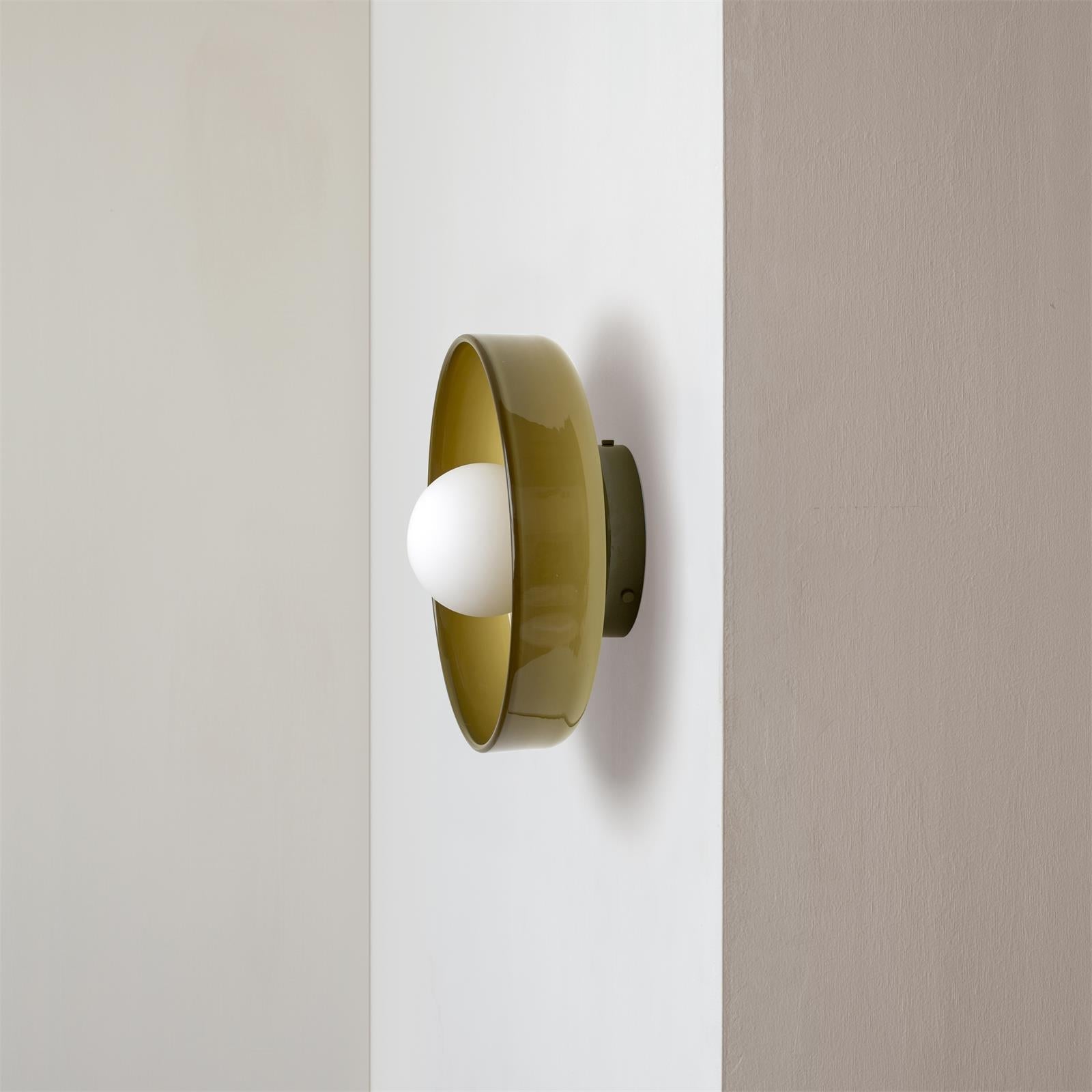 "Minimal flush mount ceiling light with frosted shade, sleek finish, offers soft illumination; ideal for modern and tradition