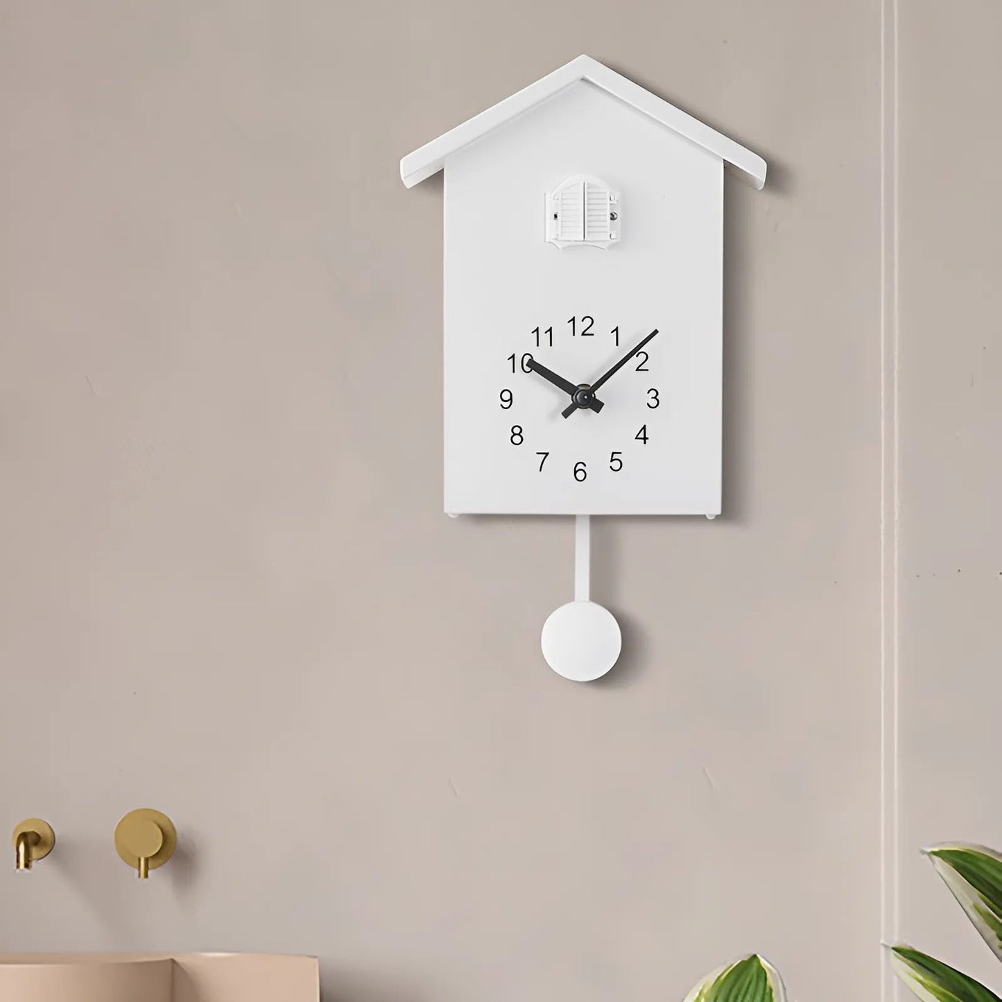 "Minimalist cuckoo wall clock with sleek black and white finish, modern design, whimsical bird element, compact 20x25cm size.