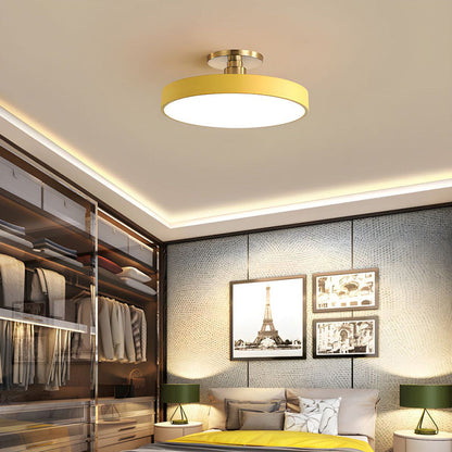 "Minimalist LED ceiling light, semi-flush design, brightens spaces with elegant style and energy-efficient glow."