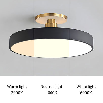 "Minimalist LED ceiling light, semi-flush design, brightens spaces with elegant style and energy-efficient glow."