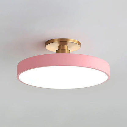 "Minimalist LED ceiling light, semi-flush design, brightens spaces with elegant style and energy-efficient glow."