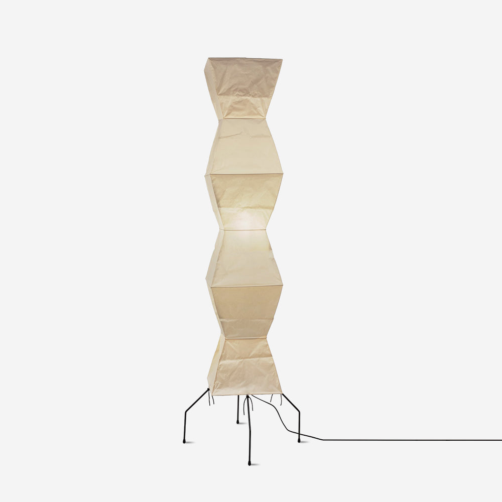 "Minimalist rice paper floor lamp with sleek metal frame and soft diffused light, perfect for creating a warm ambiance."