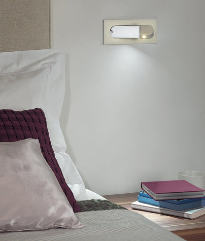 Modern adjustable LED bedside lamp in matte black with a sleek design, featuring an adjustable head for focused reading light