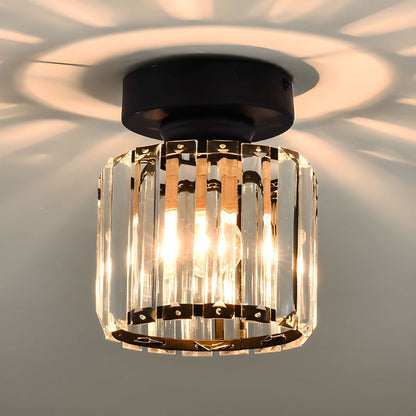 Modern black crystal flush mount ceiling light, sleek brass fixture, crystal shade, ideal for rooms with low ceilings.
