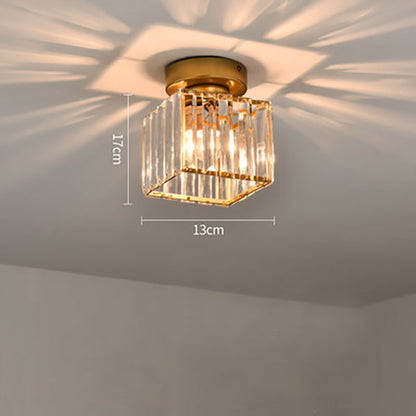 Modern black crystal flush mount ceiling light, sleek brass fixture, crystal shade, ideal for rooms with low ceilings.