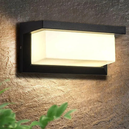 Modern black LED outdoor wall light with motion sensor, waterproof ABS, enhances security, suits balconies, porches, gardens.
