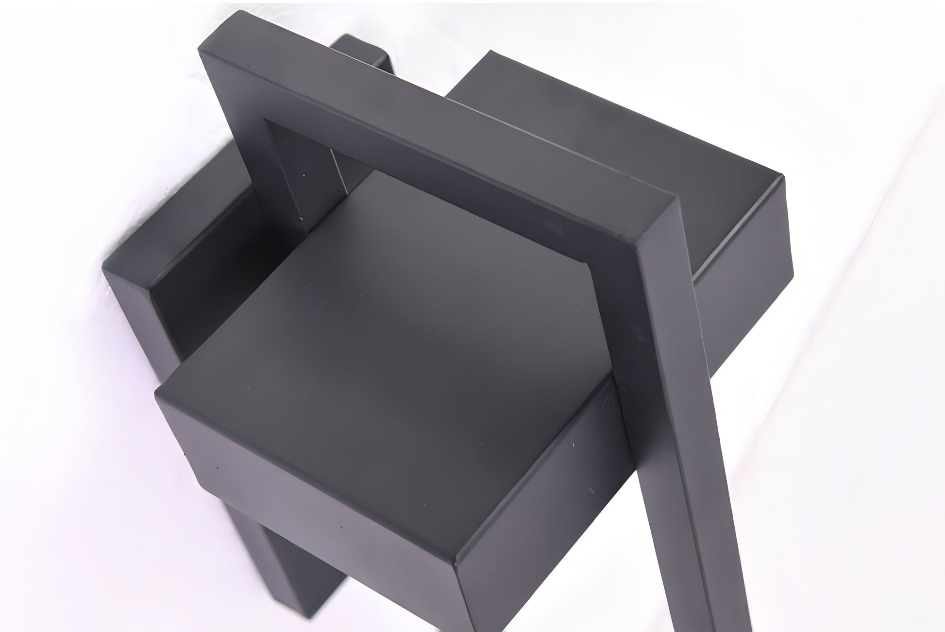 Modern black outdoor wall light with stainless steel finish, sleek design, perfect for enhancing exterior ambiance.