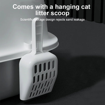 "Modern enclosed cat litter box with swing door, pull-out tray, high walls in grey and white, stylish pet supplies solution."