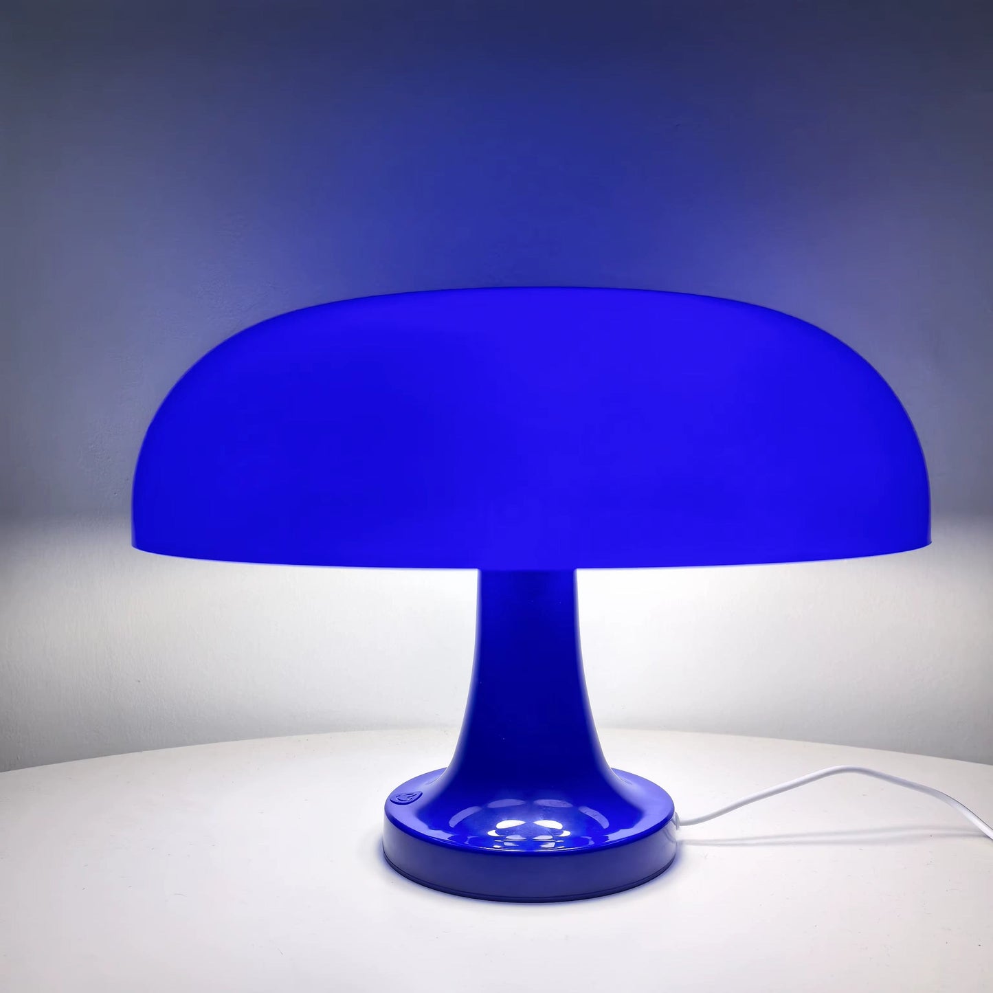 "Modern LED table lamp with USB charging, dimmable light, sleek ABS design, ideal for bedrooms or living rooms."