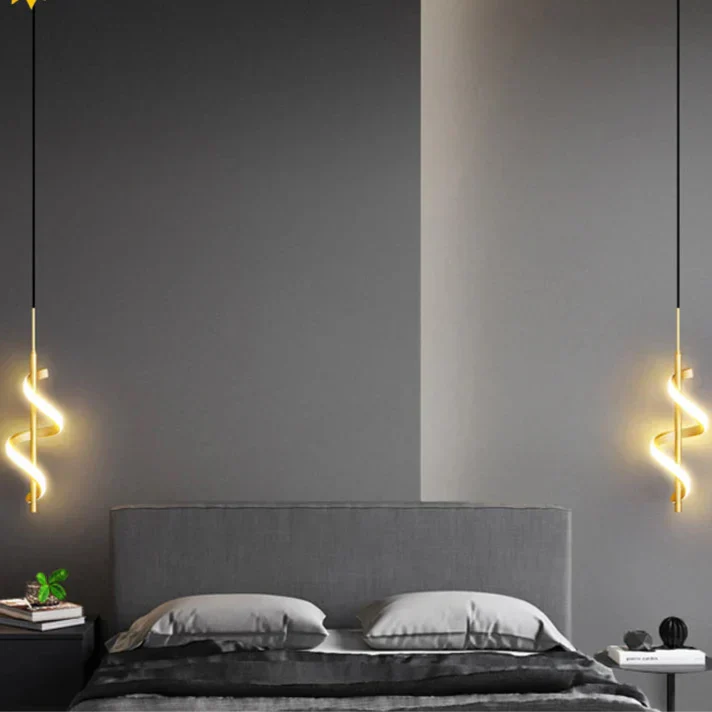 Modern LED wall sconce with adjustable gold arm and copper finish, ideal for ambient lighting in living rooms and bedrooms.