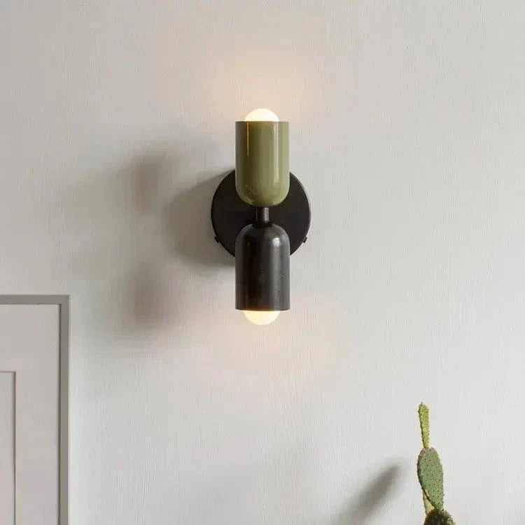 "Modern Nordic wall lamp with colorful metal design, dual light source, and sleek finish for contemporary interiors."