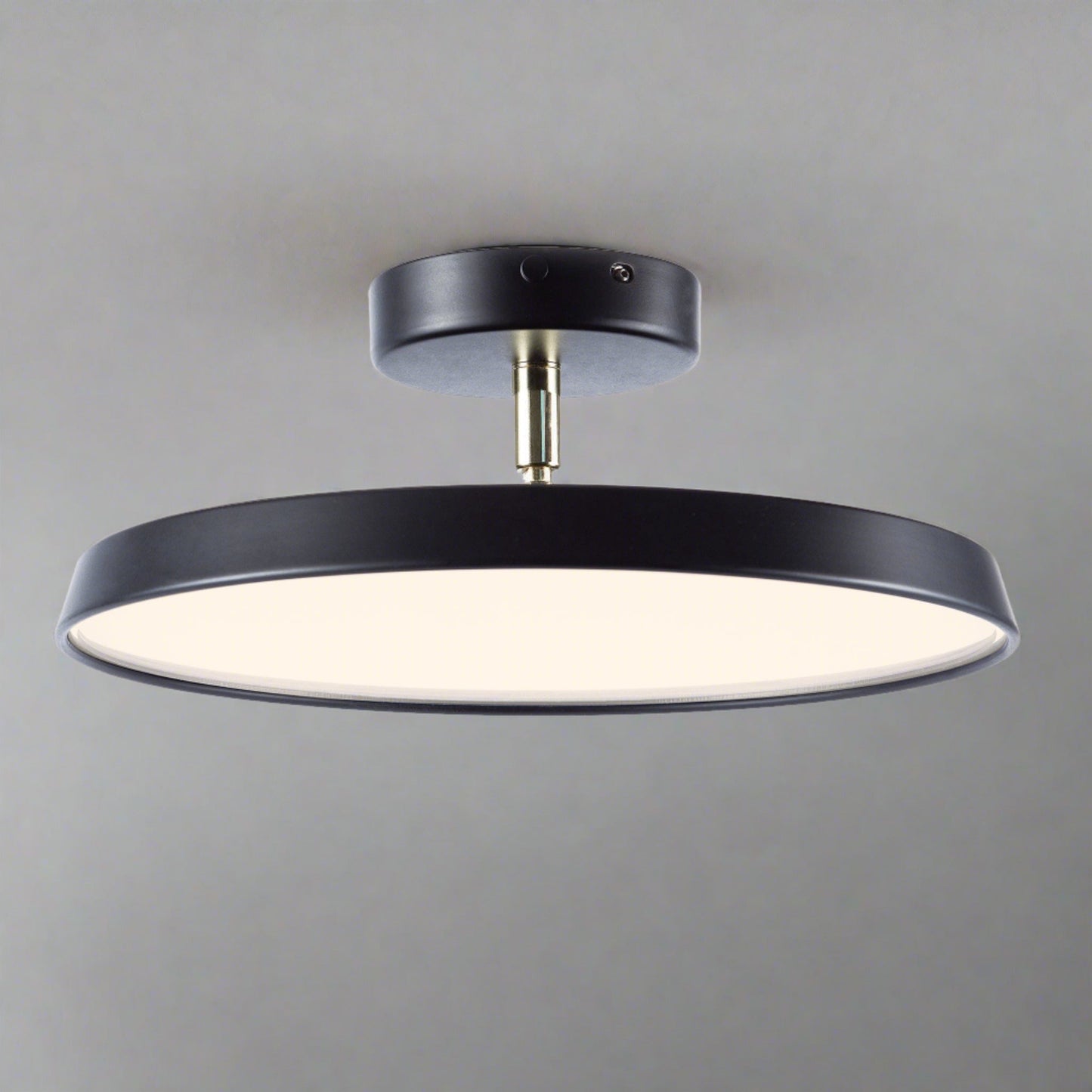 "Modern semi-flush ceiling light with sleek design, adjustable tones, and energy-efficient LED, perfect for any room ambiance