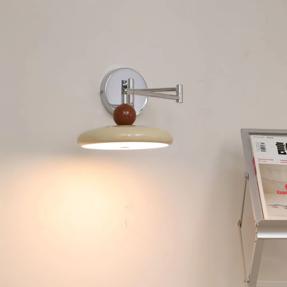 "Modern swing arm wall lamp with adjustable metal arm, acrylic base, integrated LED, beige and green color options."