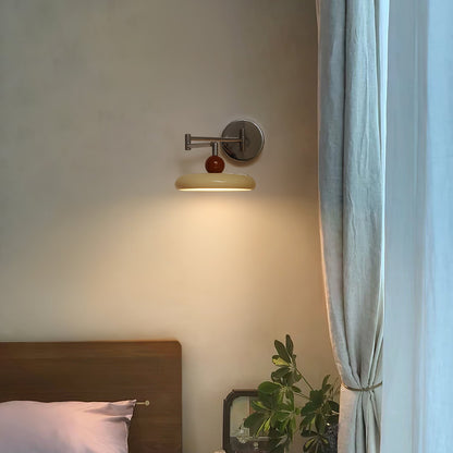 "Modern swing arm wall lamp with adjustable metal arm, acrylic base, integrated LED, beige and green color options."