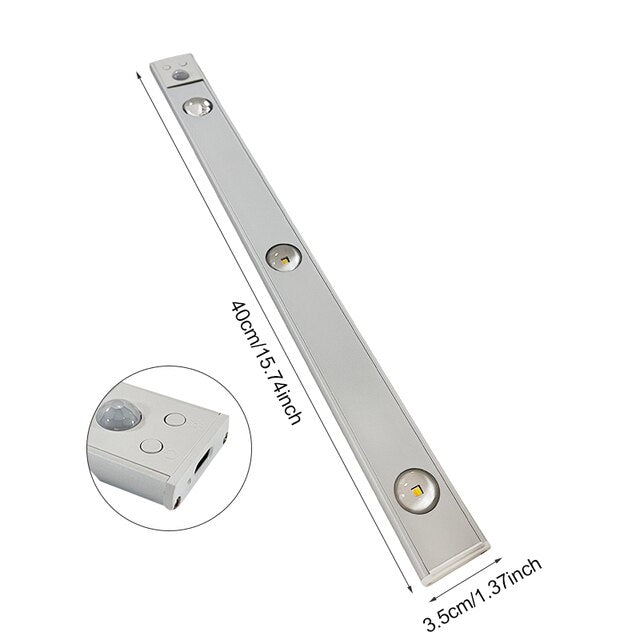 "Motion Sensor LED Light Fixture, wireless, adjustable, sleek design in black, perfect for lighting hallways and living rooms