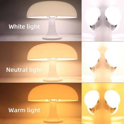 "Mushroom-shaped minimalist table lamp with LED, Nordic design, in white and orange; perfect for modern interiors."