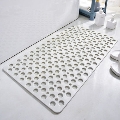 Non-slip shower mat with suction cups, textured for comfort, mold-resistant, in blue, green, grey; enhances bathroom safety.