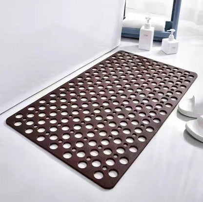 Non-slip shower mat with suction cups, textured for comfort, mold-resistant, in blue, green, grey; enhances bathroom safety.