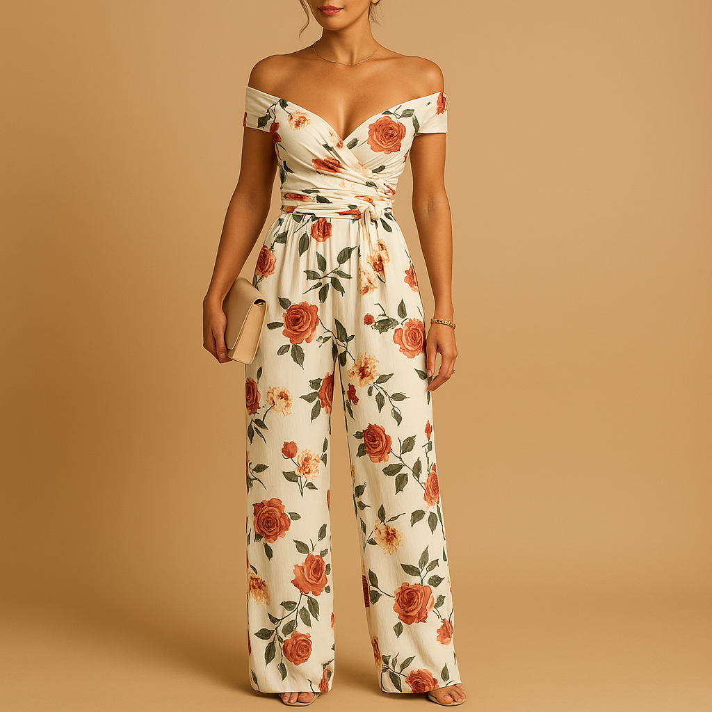 Women’s off-shoulder jumpsuit with red and blue floral print, fitted silhouette, and breathable fabric, perfect for weddings or events.