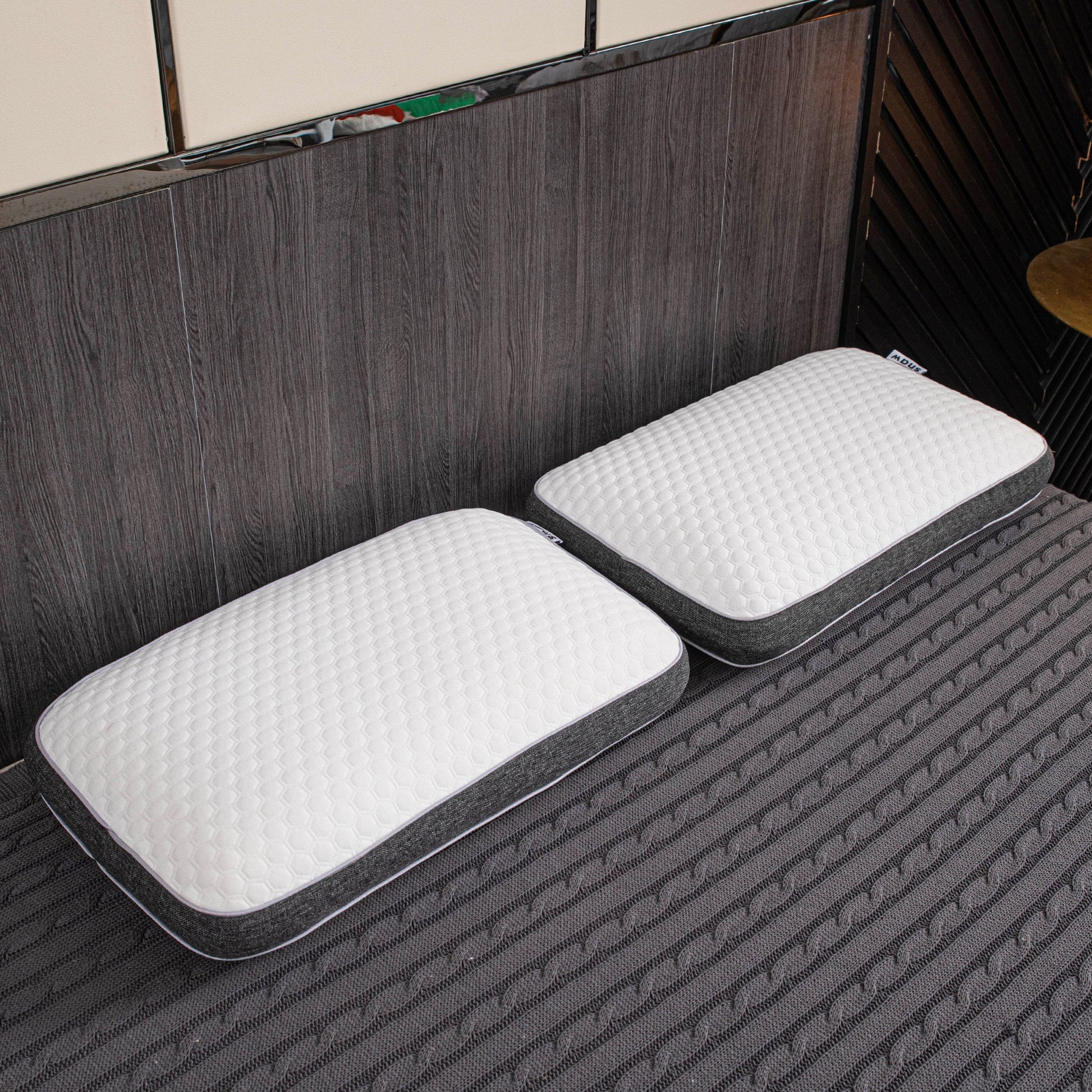 Orthopedic memory foam pillow offering pain-free sleep with ergonomic design and breathable cover for all sleep positions.