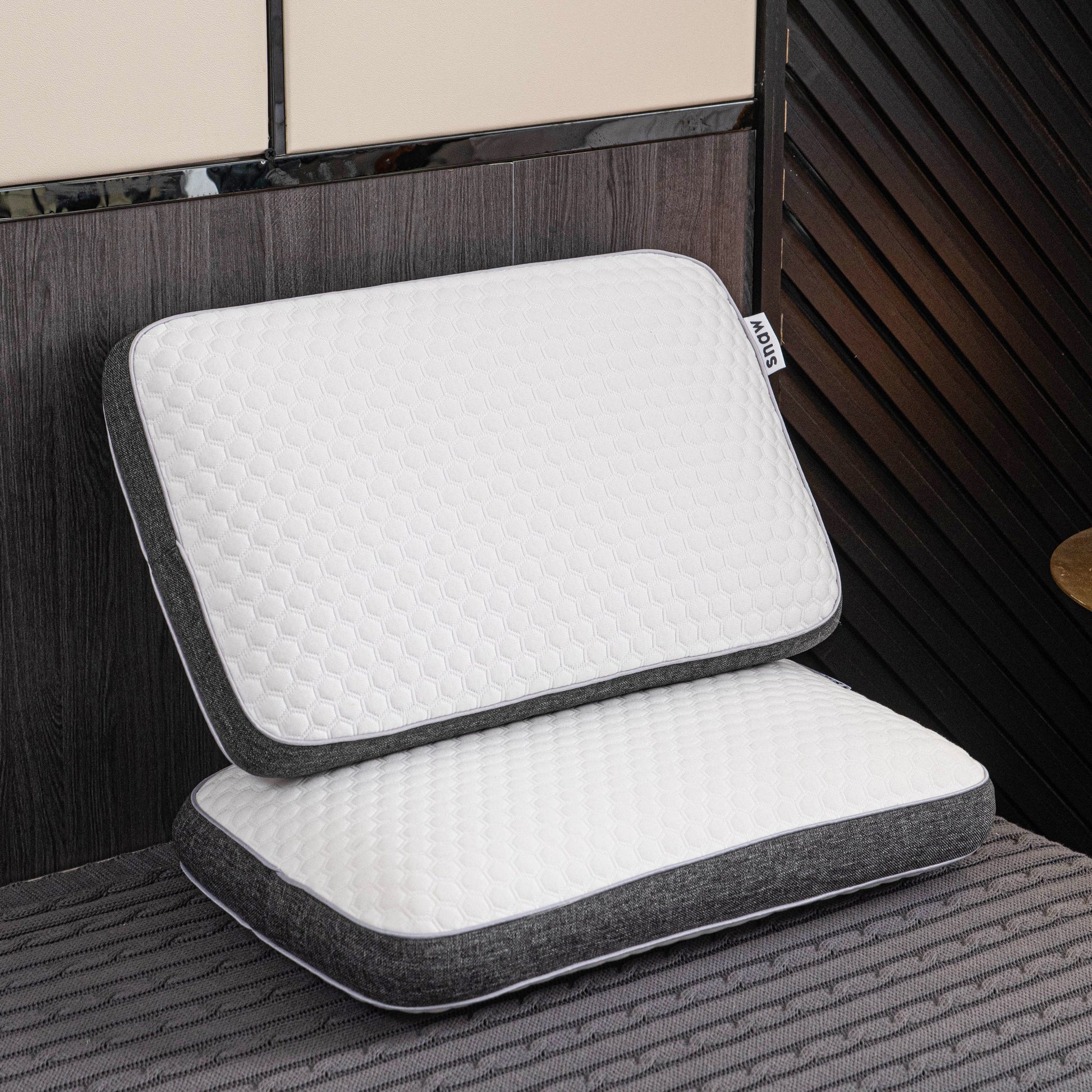 Orthopedic memory foam pillow offering pain-free sleep with ergonomic design and breathable cover for all sleep positions.