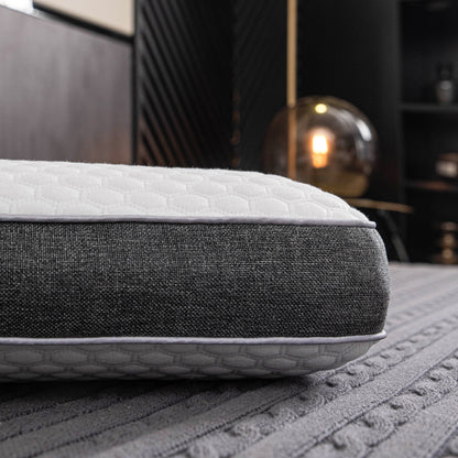 Orthopedic memory foam pillow offering pain-free sleep with ergonomic design and breathable cover for all sleep positions.