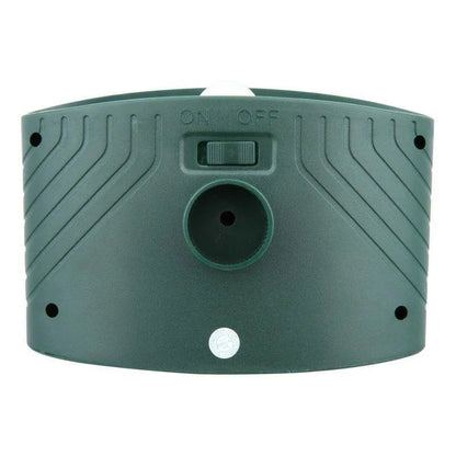 "Outdoor solar-powered ultrasonic deer repeller in garden setting, showcasing green and grey weather-resistant design."