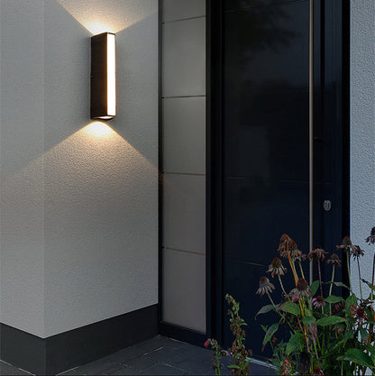 Outdoor wall light with LED technology, rustproof aluminum, sleek design, waterproof, ideal for garden or patio lighting.