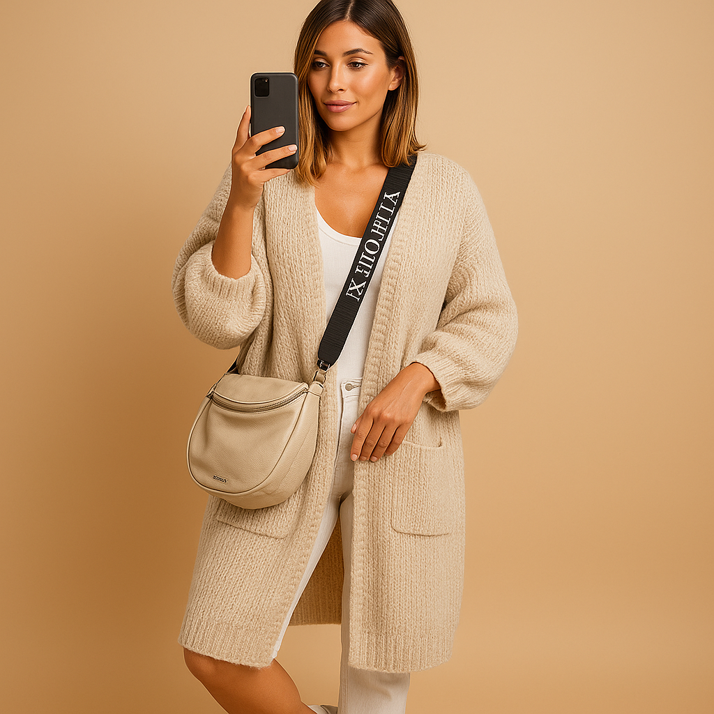 Women’s oversized cardigan vest in elegant draped design, ideal for layering and everyday comfort with feminine styling.