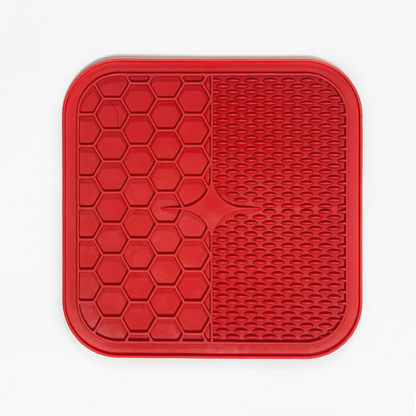 "Pet silicone lick mat in vibrant colors for stress relief and slow feeding; features textured surface for pets' wellness."