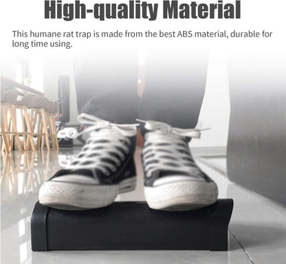 "Plastic rat trap cage with bionic design, sleek black finish, humane no-kill, efficient pest control, easy to use and clean.
