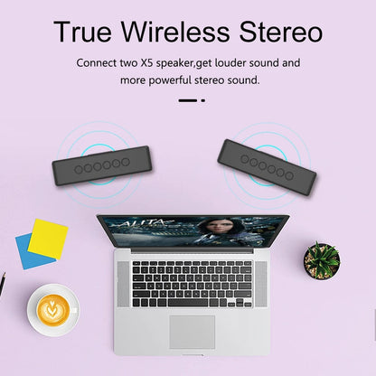 "Portable black waterproof 30W Bluetooth speaker with 4000mAh battery, dual drivers, compact for outdoor use."