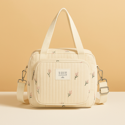 Quilted baby travel bag for women with insulated interior, cushioned design, and multiple compartments—perfect for on-the-go mums and daily baby care.
