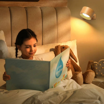 "Rechargeable 360° rotating wall light, features sleek design with magnetic ball joint, touch control, and adjustable lightin