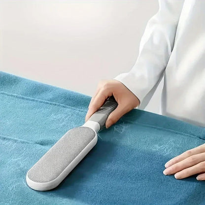 Reusable microfiber dust brush with soft bristles, ideal for cleaning dust, lint, and pet hair from various surfaces efficien
