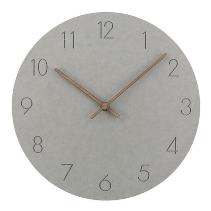 "Silent Scandinavian wall clock with minimalist design, natural wood finish, enhancing elegant home décor"