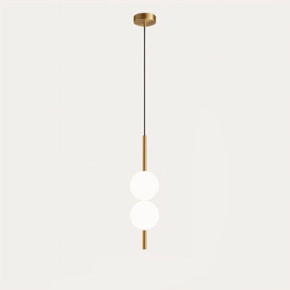 "Sleek glass ball Nordic pendant light with metal frame, LED bulb; available in black or brass, perfect for modern decor."