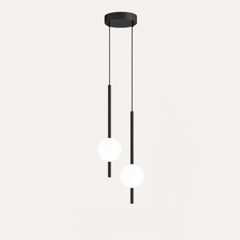 "Sleek glass ball Nordic pendant light with metal frame, LED bulb; available in black or brass, perfect for modern decor."