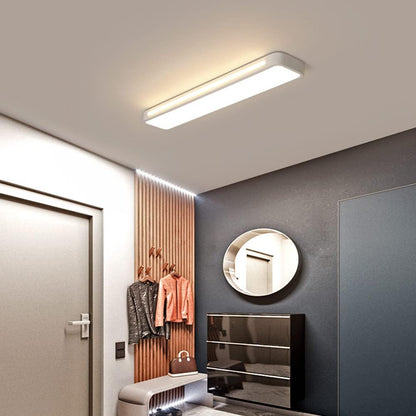 "Sleek minimalist linear LED ceiling light with iron and acrylic design, perfect for modern homes, available in three sizes."