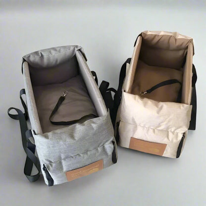 "Small Dog Cosy Car Seat Carrier Basket with padded interior, sleek design, fits securely in car for safe pet travel."