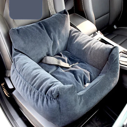 "Soft, padded pet car seat cover for dogs and cats. Features adjustable straps, fits most vehicles for safe, comfy travel."